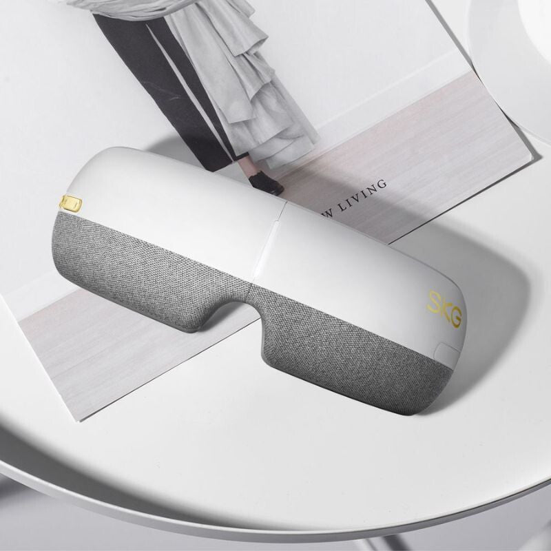 SKG E3-EN Fehér Okos Szemmasszírozó – Bluetooth Zene, Melegítő és Légnyomásos Masszázs - Maxihome