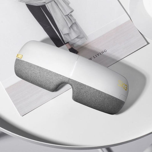SKG E3-EN Fehér Okos Szemmasszírozó – Bluetooth Zene, Melegítő és Légnyomásos Masszázs - Maxihome