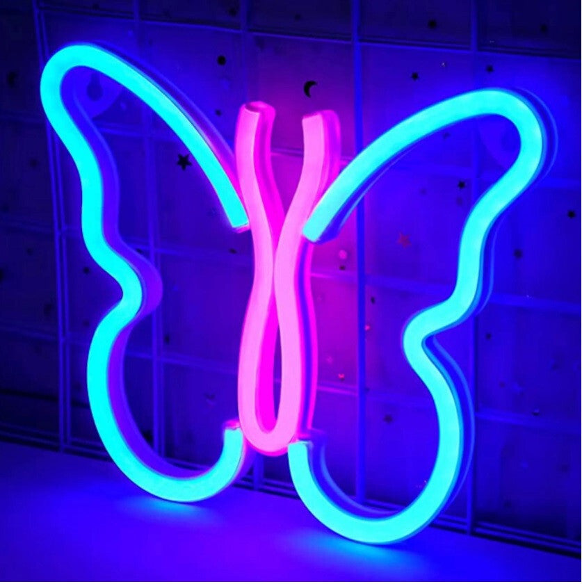 Pillangó alakú neon lámpa ferdén, átlátszó akril hátlappal közelről
