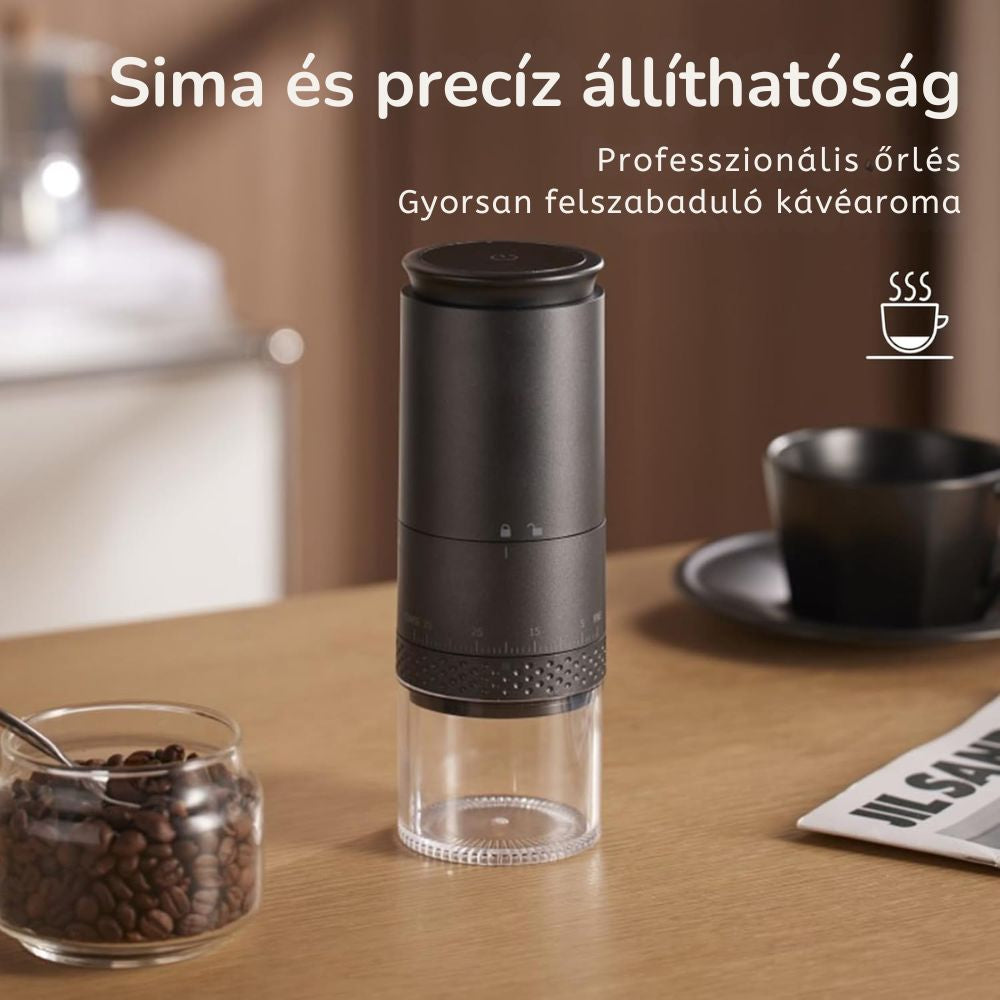 Fekete kávédaráló konyhapulton kávébabbal és csészével, állítható őrlési fokozat